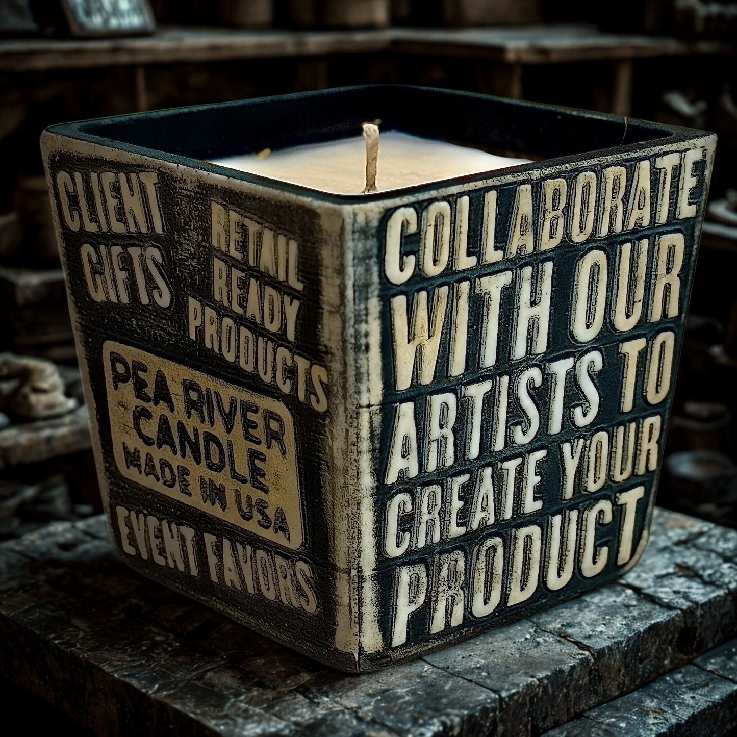 Custom soy candle in concrete vessels for retail by Pea River Candle Company