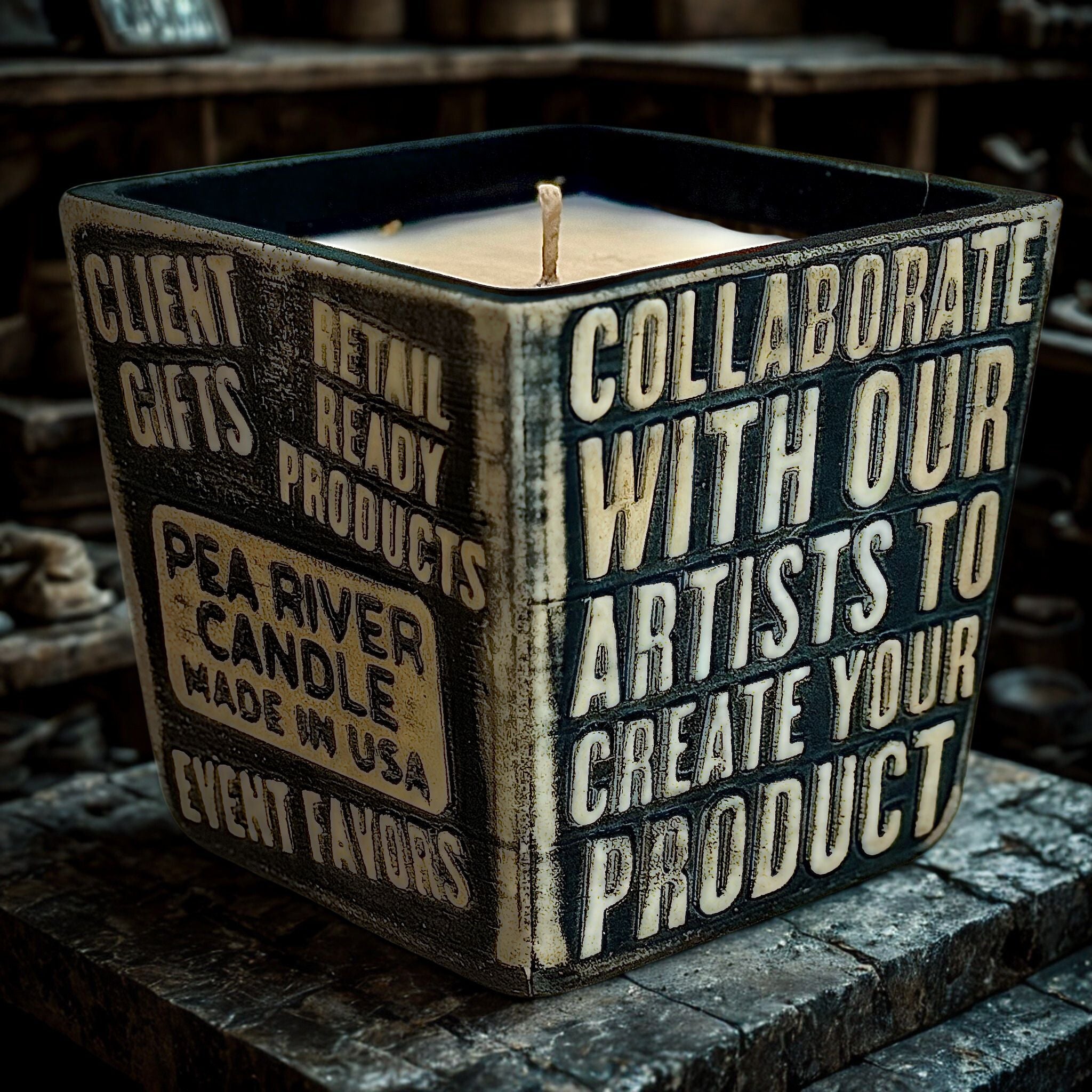 Custom soy candle in concrete vessels for retail by Pea River Candle Company